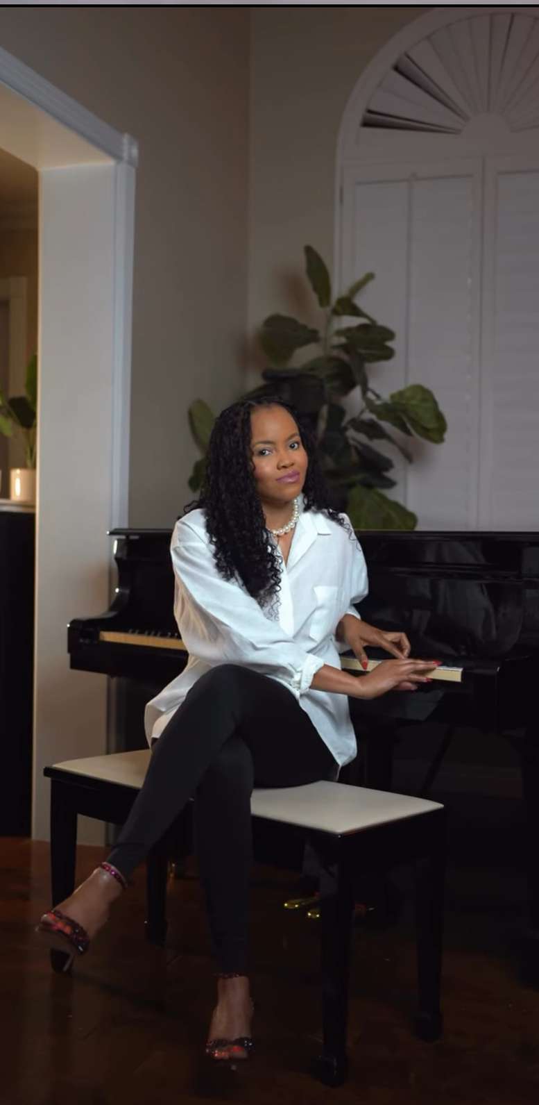 Grace in front of the camera for the studio's content.