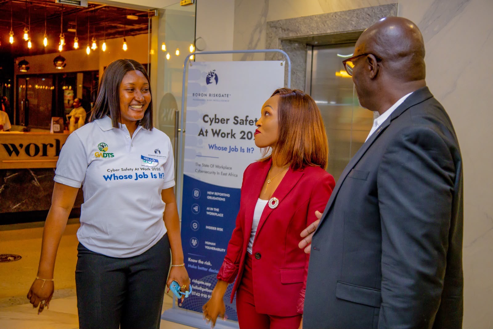 At the venue entrance, welcoming the guest speaker to the launch.