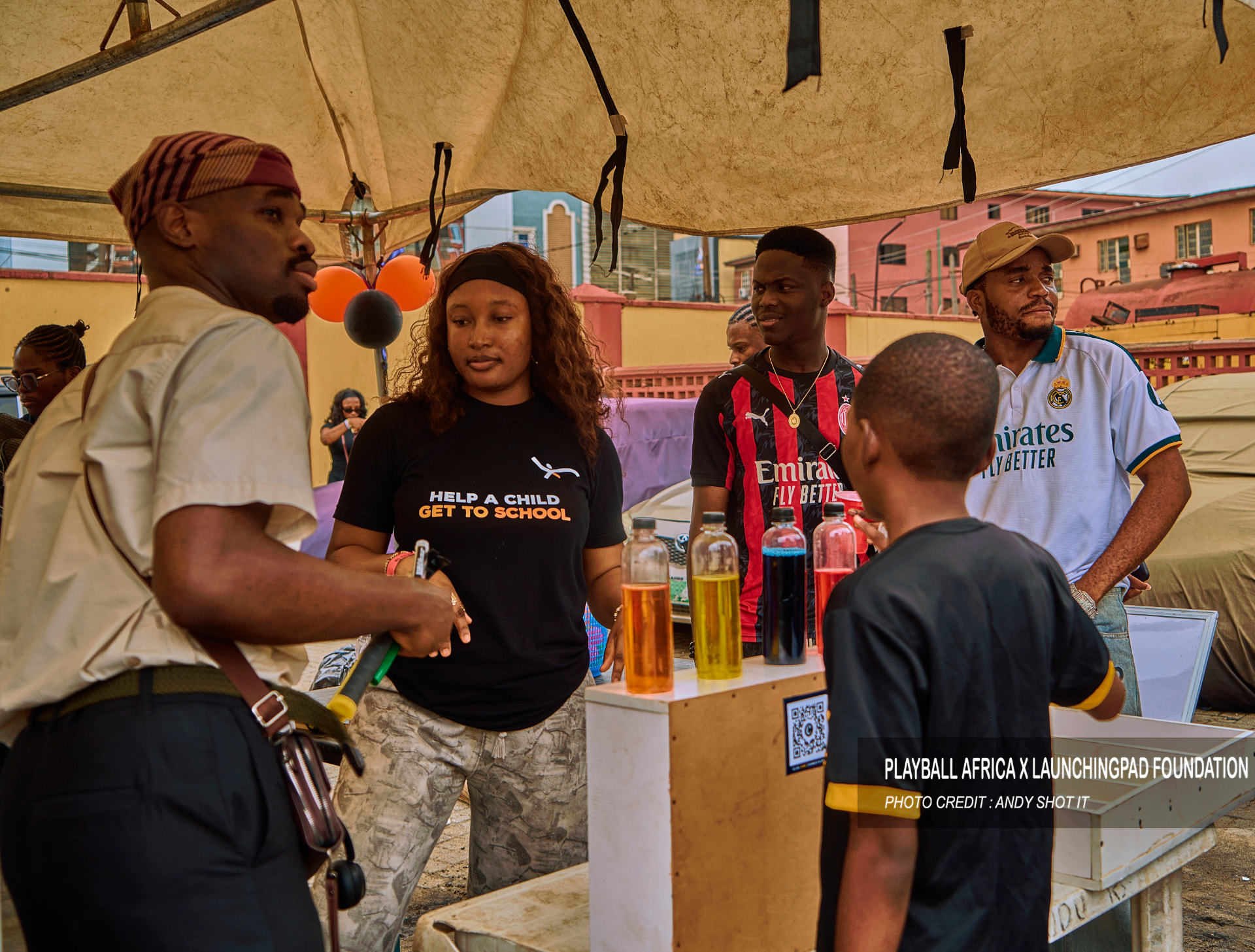 Grace at the drinks stand, on a day her team built from the ground up.